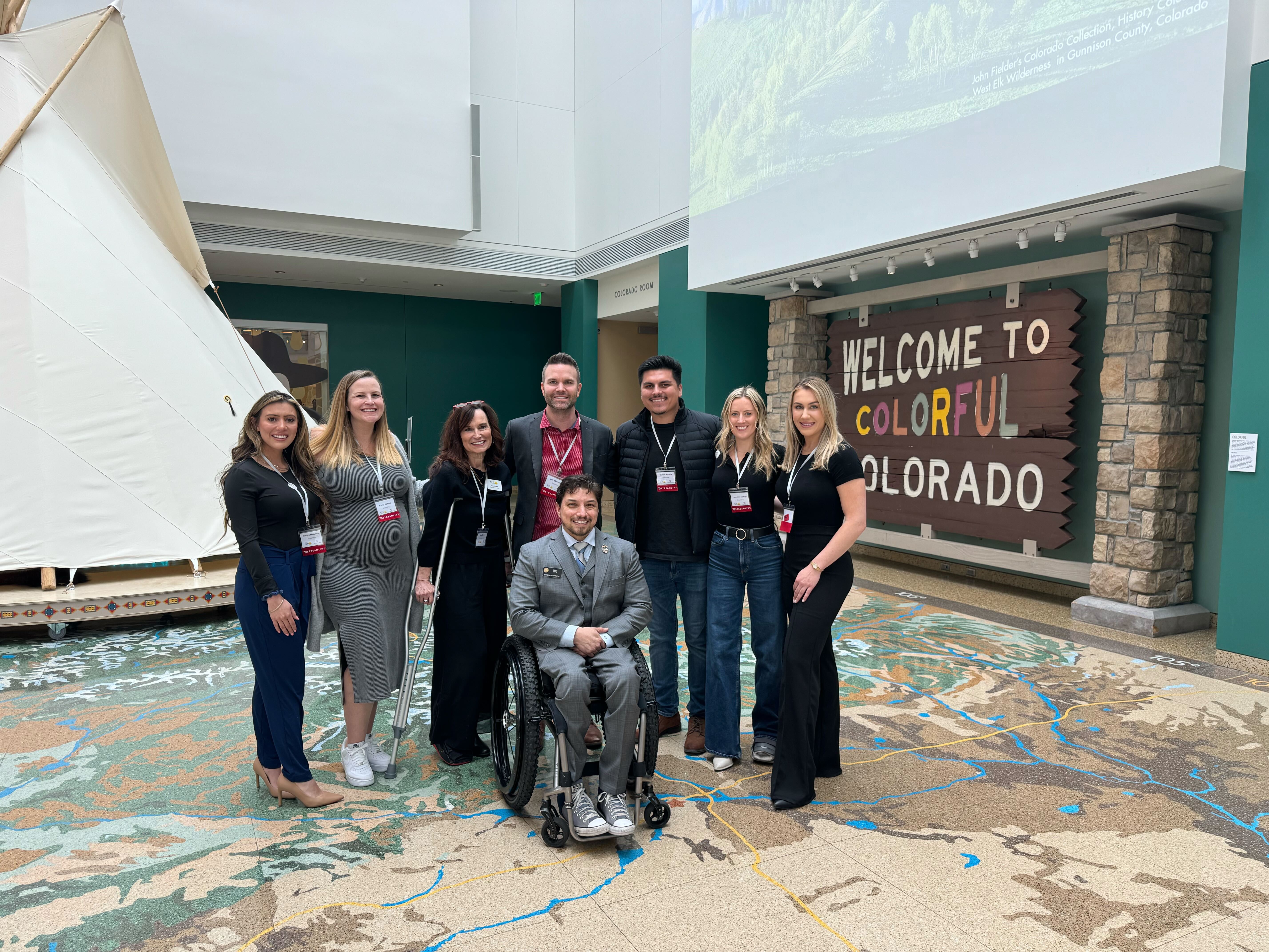 From left to right: Justice Hinojosa, Karey Hansen, Ann Terry, Mac Clemmens, Daelon Arriola, Annelise Spargo, Maria Lara, and Representative David Ortiz gather in the History Colorado Center 